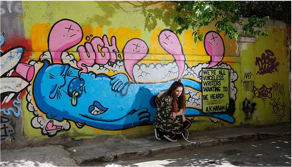 Female Street Artist combines strange creatures and geometrical patterns 